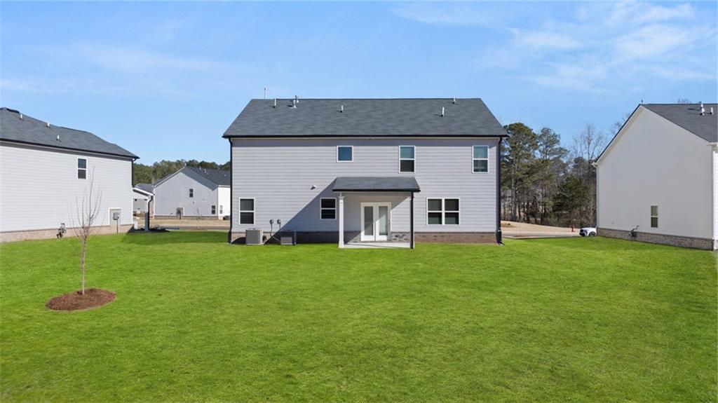 73 Weymouth Drive Locust Grove, GA 30248 - Photo 46 of 47 a view of a house with backyard