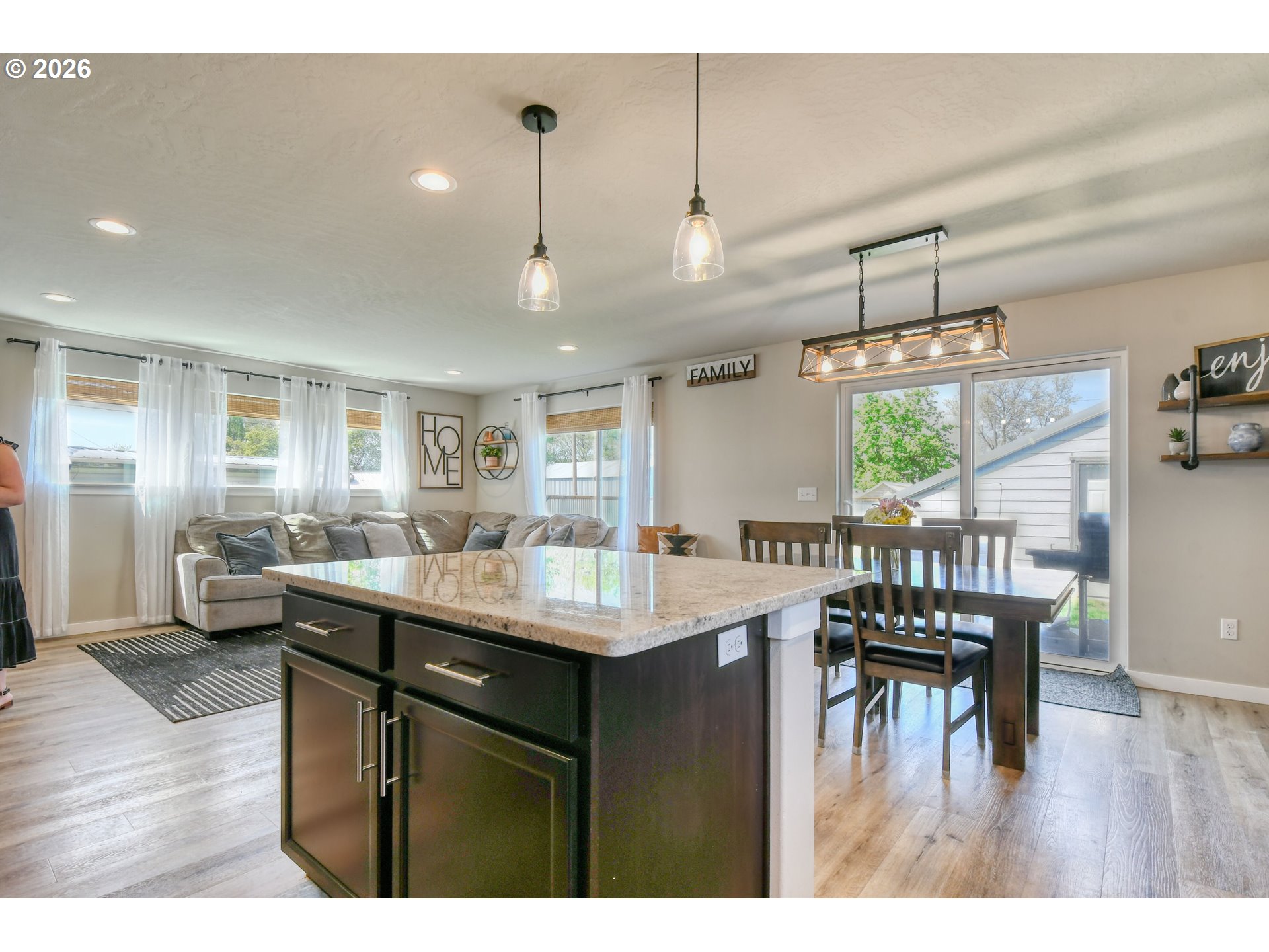 233 East Jefferson Street Athena, OR 97813 - Photo 8 of 36 a kitchen with a table and chairs