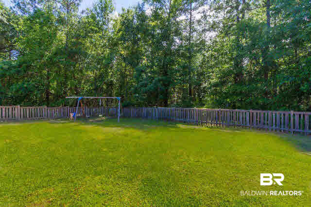 5629 Millhouse Road Gulf Shores, AL 36542 - Photo 6 of 36 Fenced Yard