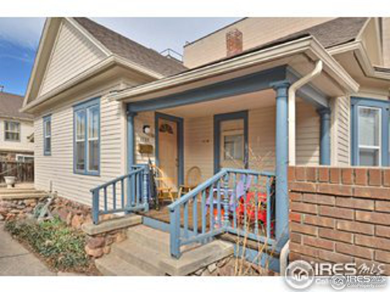 1723-1725 15th Street Boulder, CO 80302 - Photo 2 of 8 front view of a house with large windows