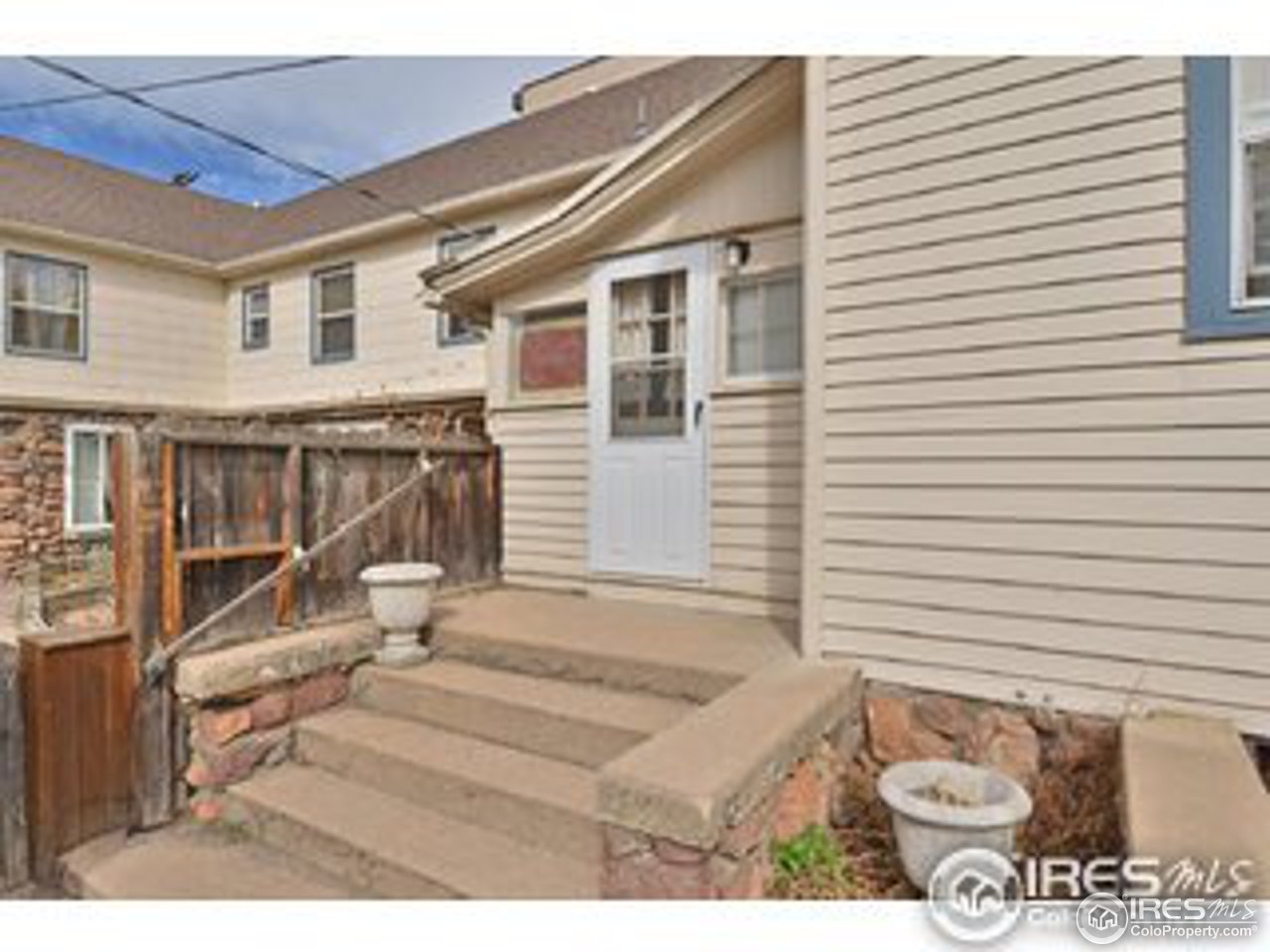 1723-1725 15th Street Boulder, CO 80302 - Photo 3 of 8 a bathroom with a sink and toilet