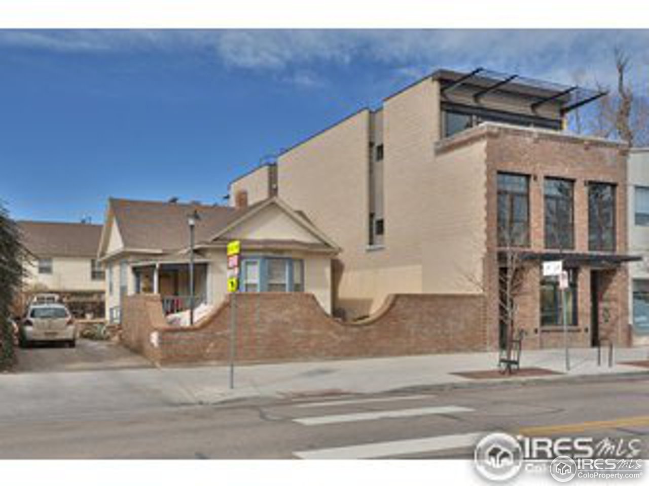 1723-1725 15th Street Boulder, CO 80302 - Photo 4 of 8 a view of a street in front of a house