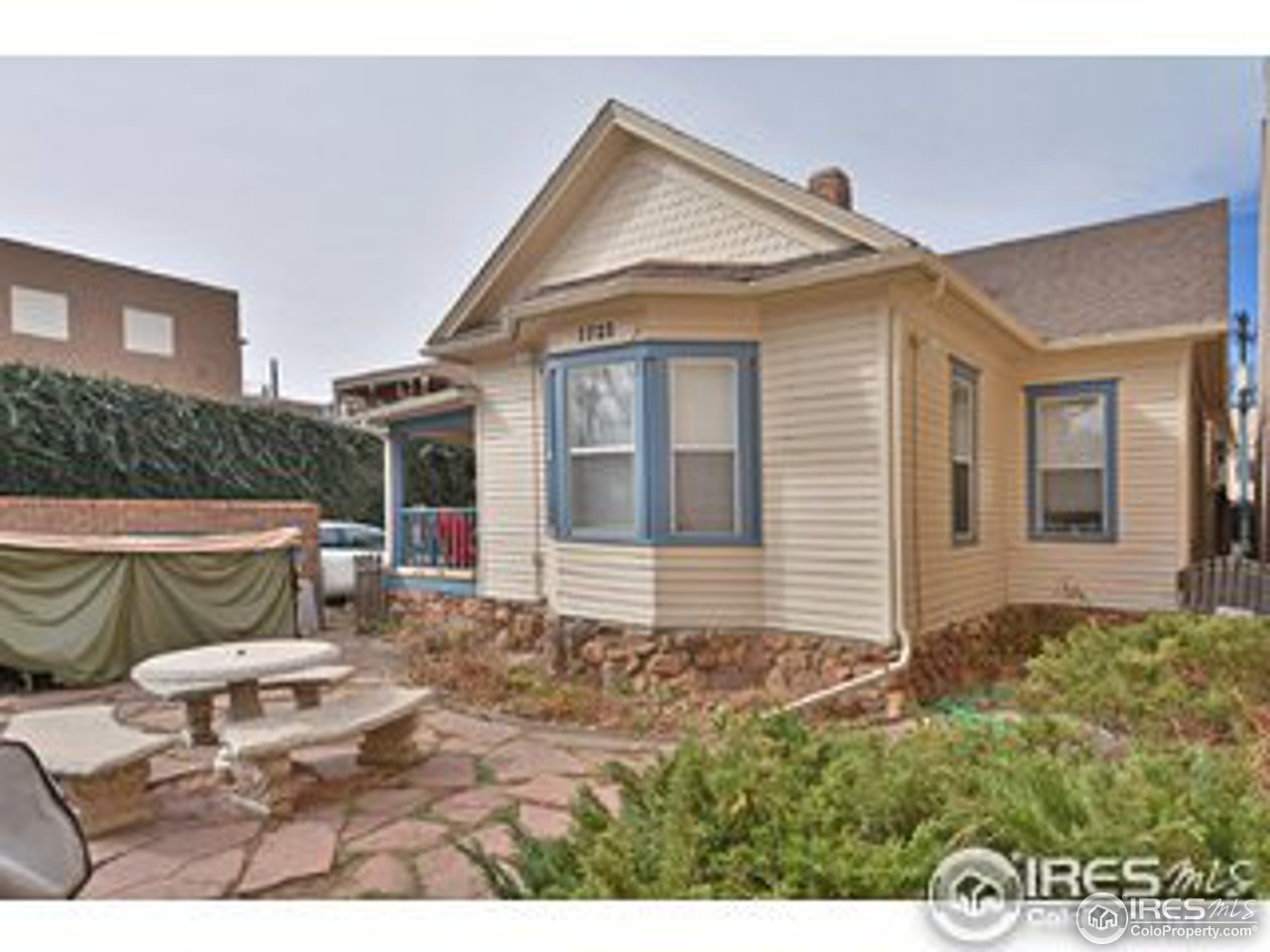 1723-1725 15th Street Boulder, CO 80302 - Photo 5 of 8 a view of a house with backyard