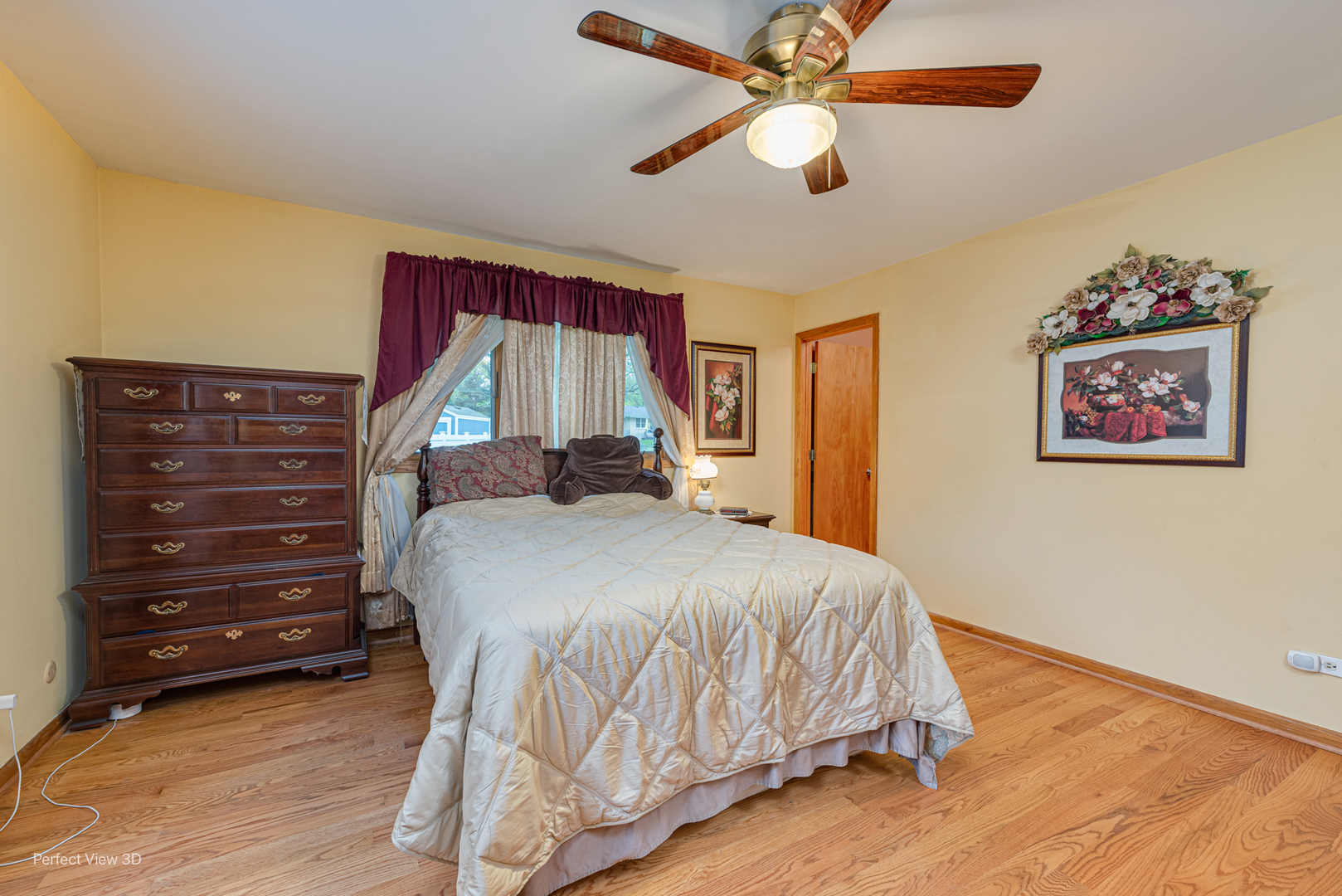 400 Illinois Road Frankfort, IL 60423 - Photo 14 of 24 a bedroom with a bed and a chandelier