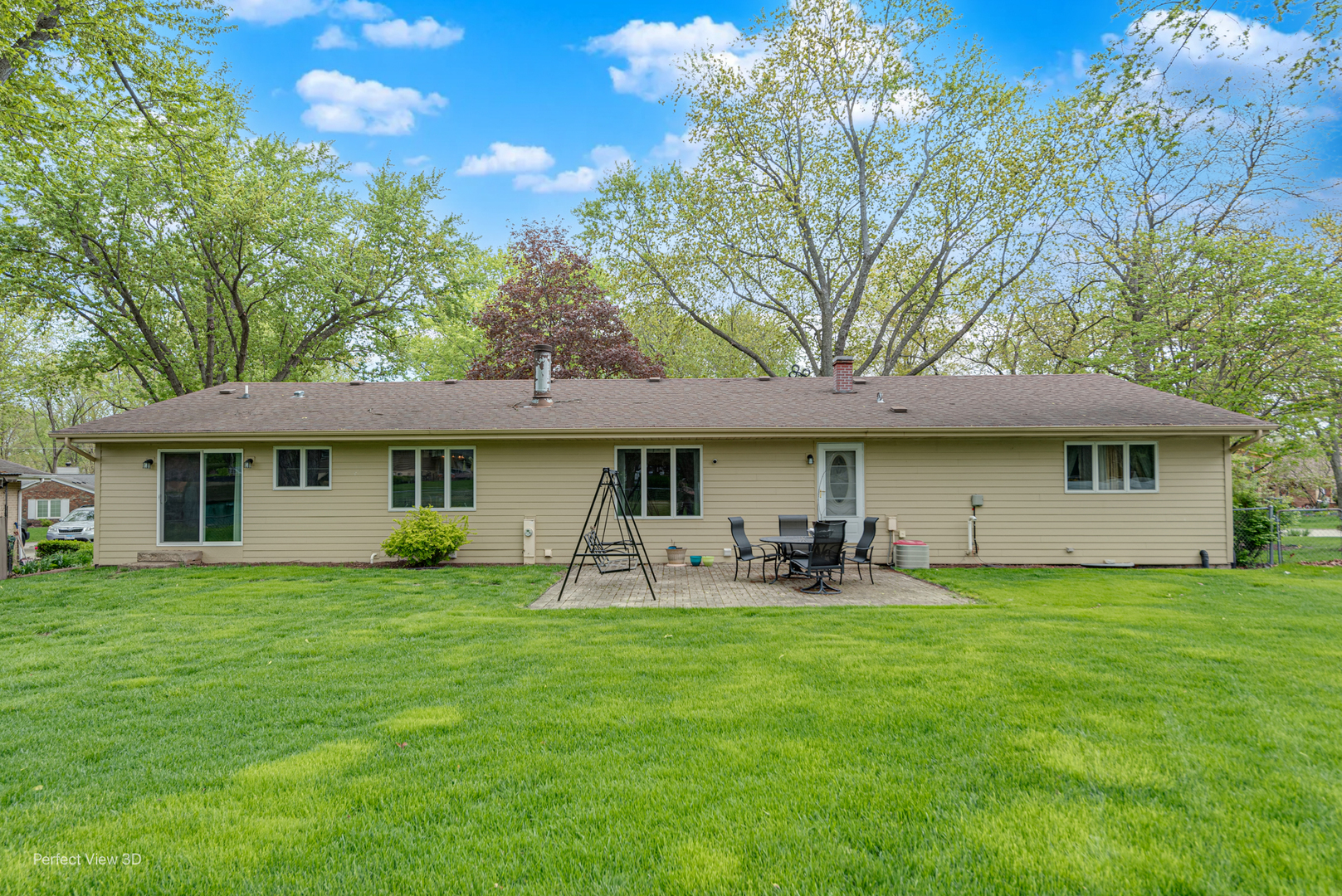 400 Illinois Road Frankfort, IL 60423 - Photo 24 of 24 a front view of a house with a garden and trees