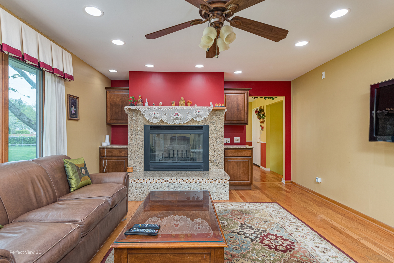 400 Illinois Road Frankfort, IL 60423 - Photo 6 of 24 a living room with furniture and a fireplace