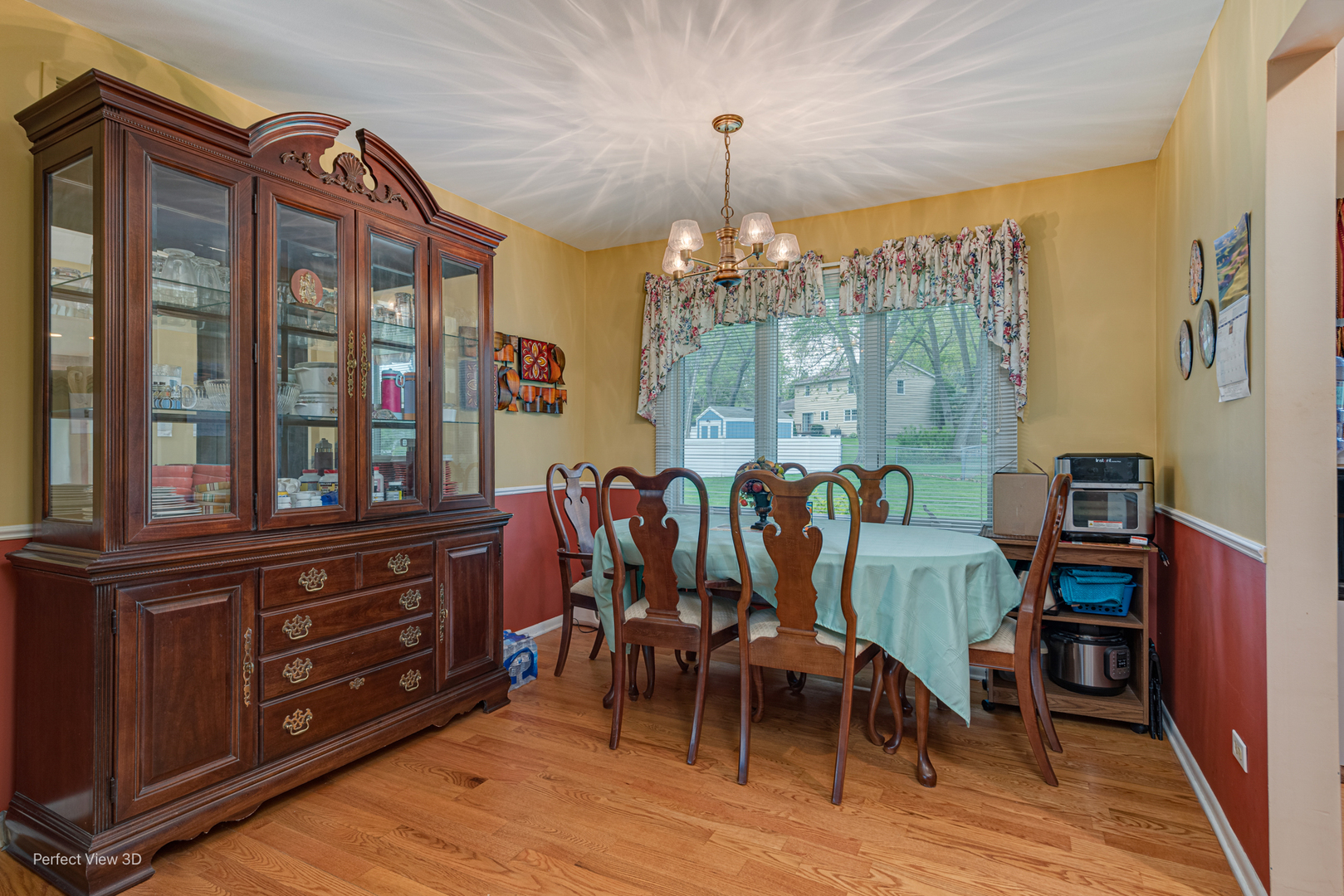 400 Illinois Road Frankfort, IL 60423 - Photo 8 of 24 a view of a dining room with furniture window and wooden floor