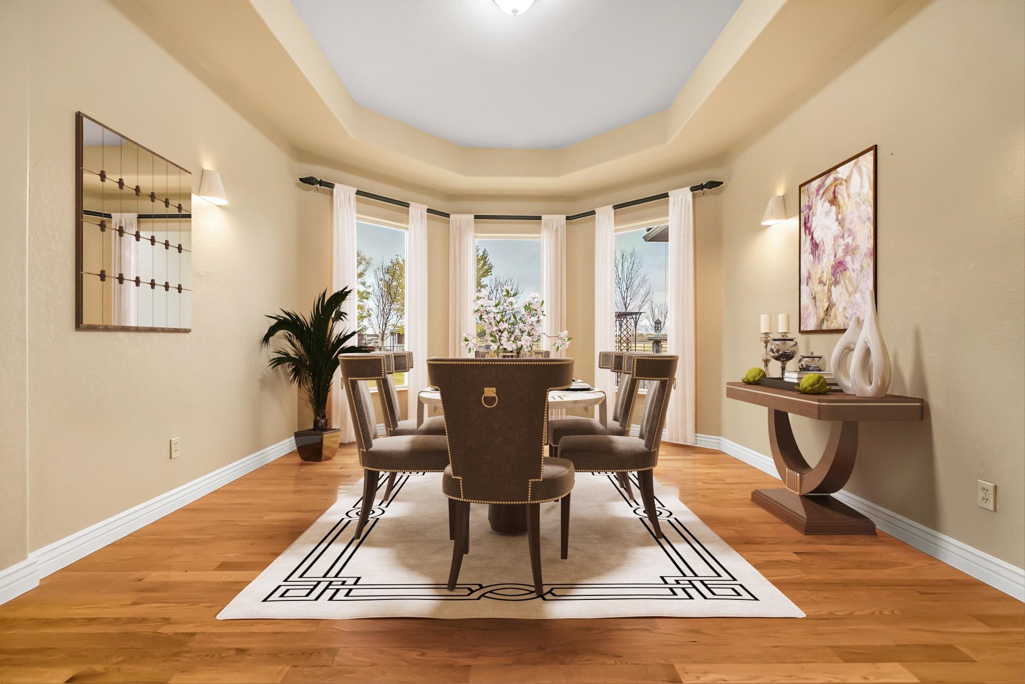 2224 H Road Grand Junction, CO 81505 - Photo 16 of 42 a dining room with wooden floor and large windows