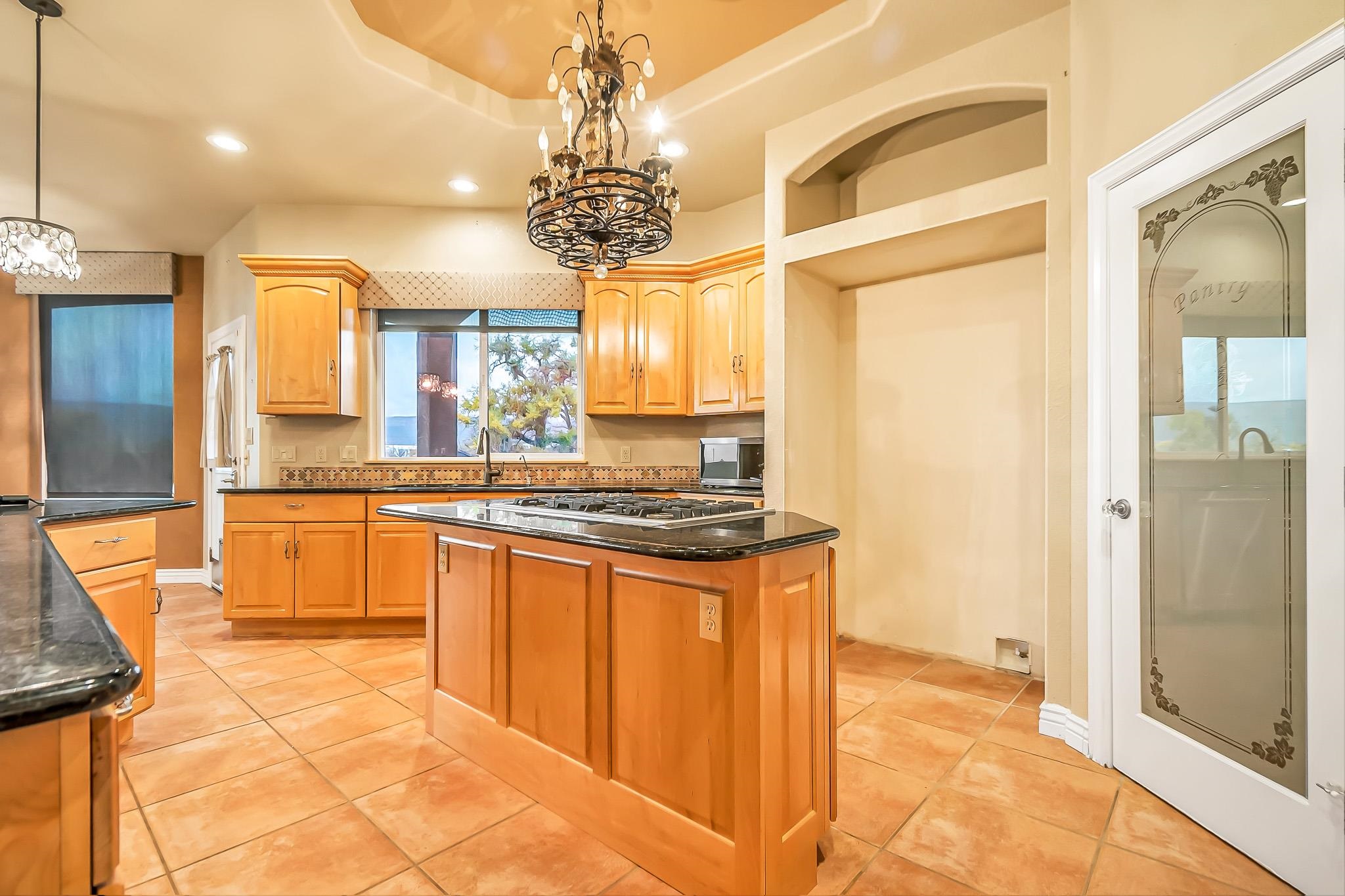 2224 H Road Grand Junction, CO 81505 - Photo 21 of 42 a large kitchen with a counter space a sink and stainless steel appliances
