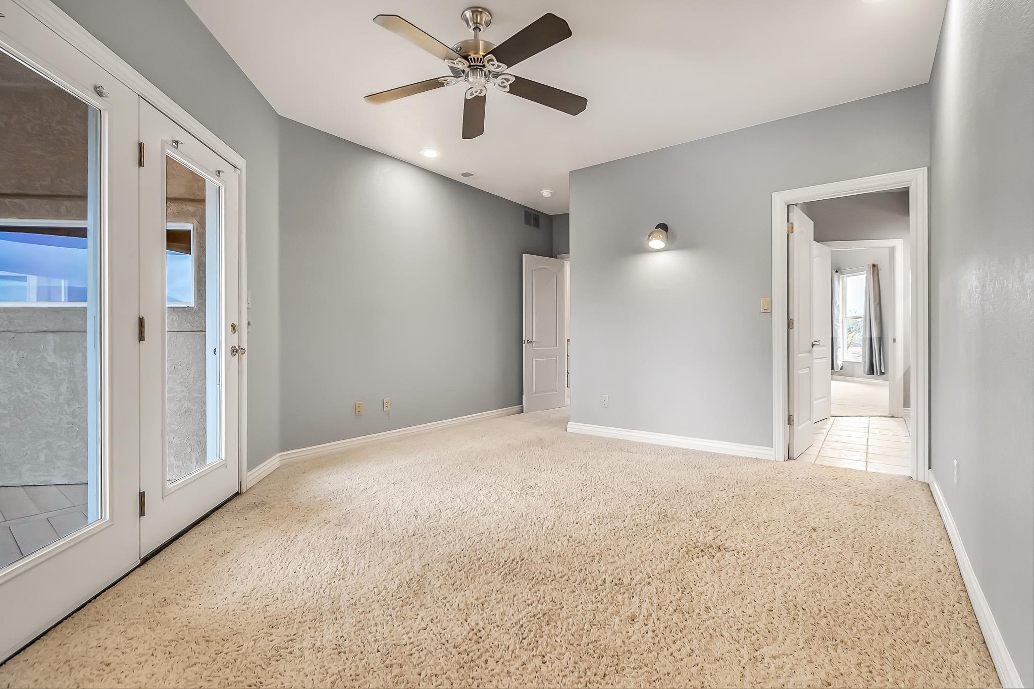 2224 H Road Grand Junction, CO 81505 - Photo 30 of 42 a view of a livingroom with a ceiling fan and window