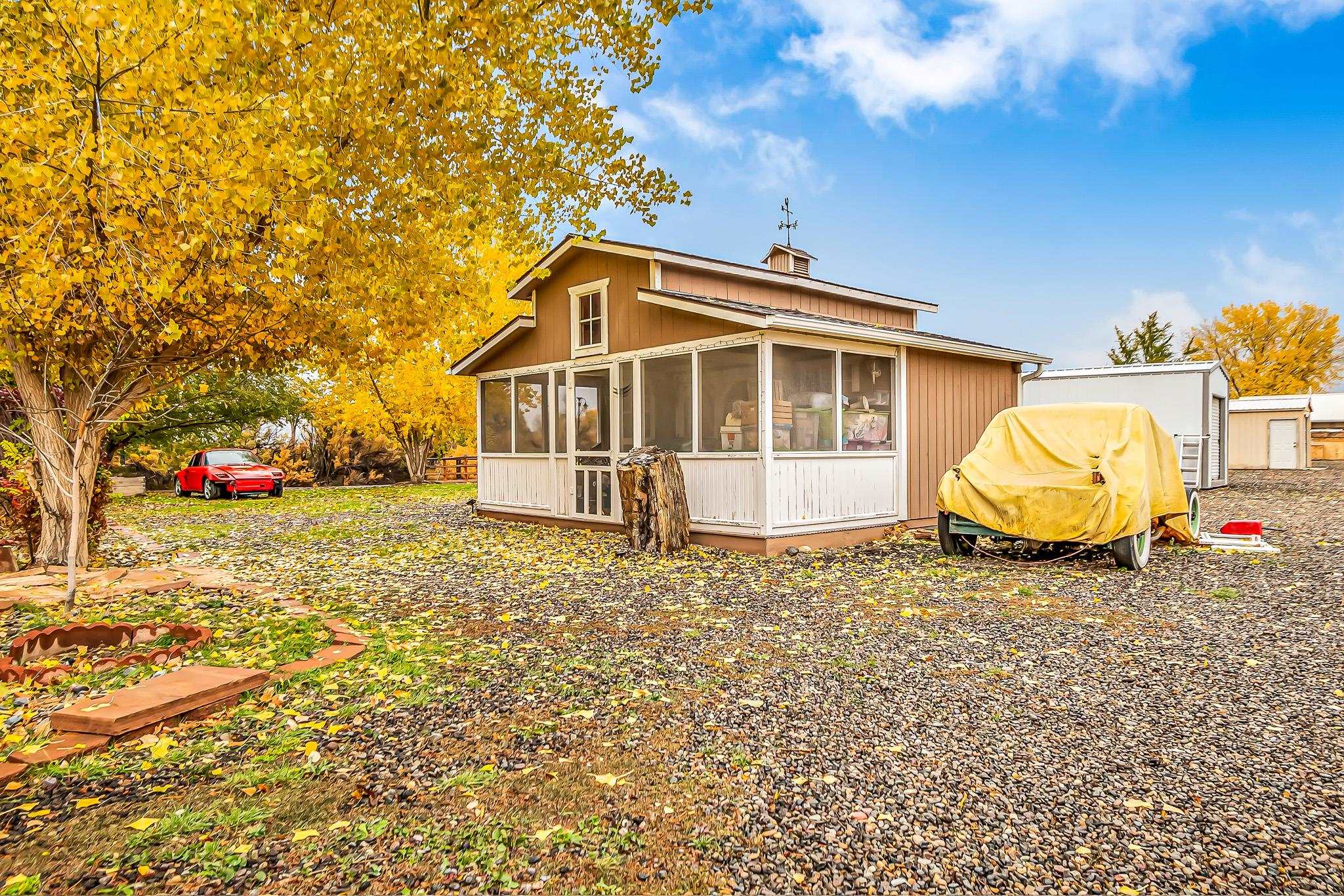 2224 H Road Grand Junction, CO 81505 - Photo 38 of 42 a view of a house with a yard