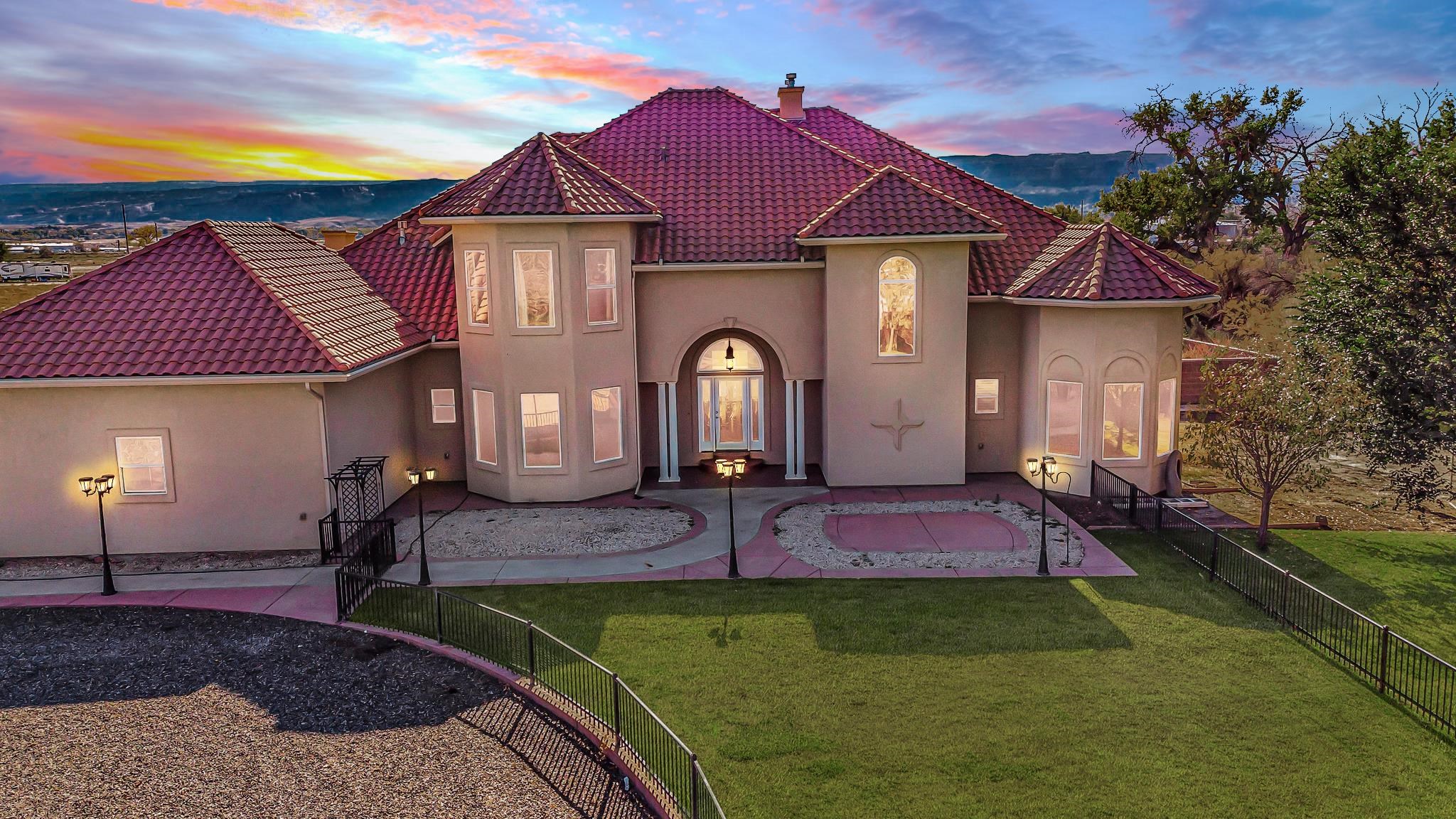 2224 H Road Grand Junction, CO 81505 - Photo 5 of 42 a front view of a house with garden