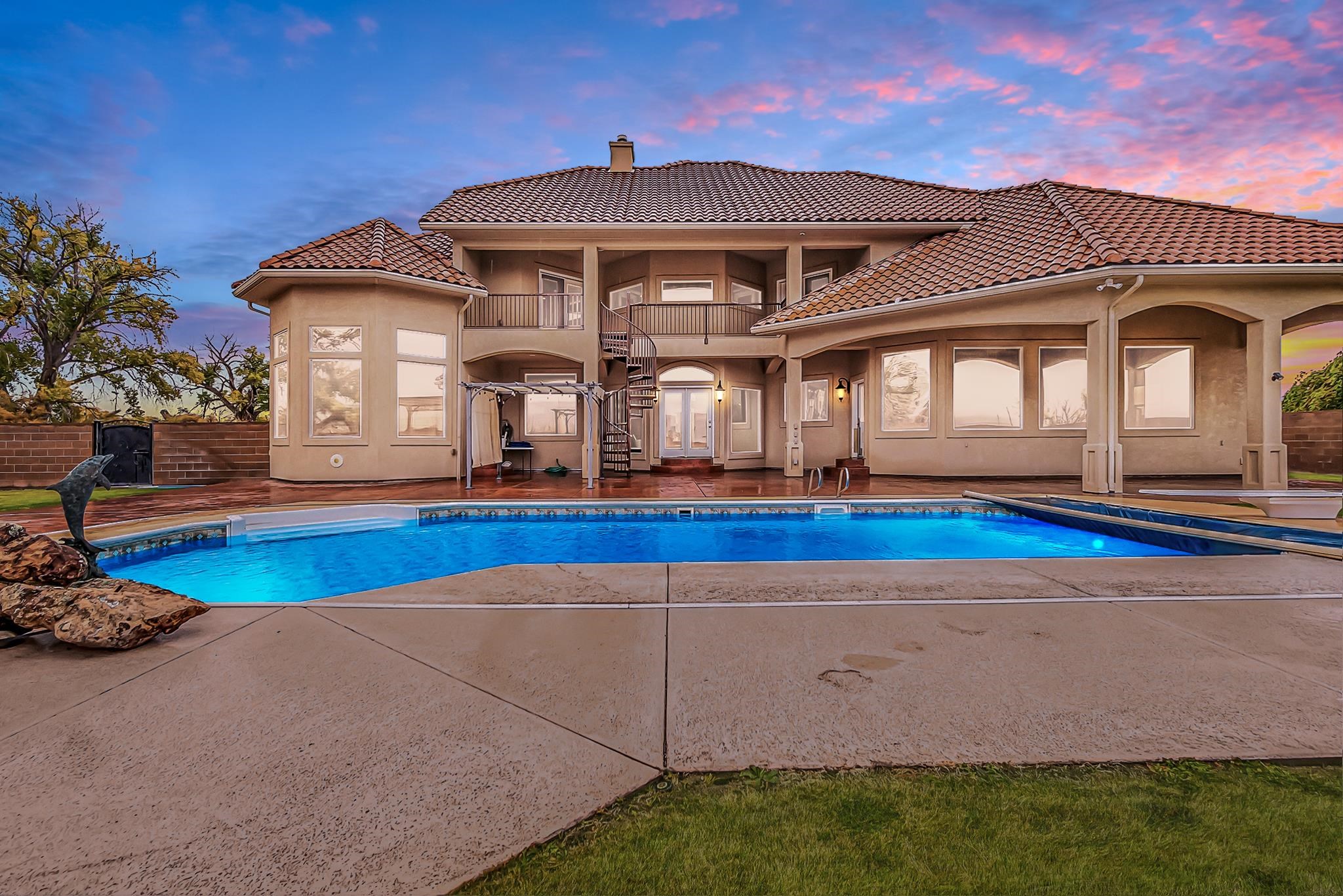2224 H Road Grand Junction, CO 81505 - Photo 6 of 42 a front view of a house with swimming pool