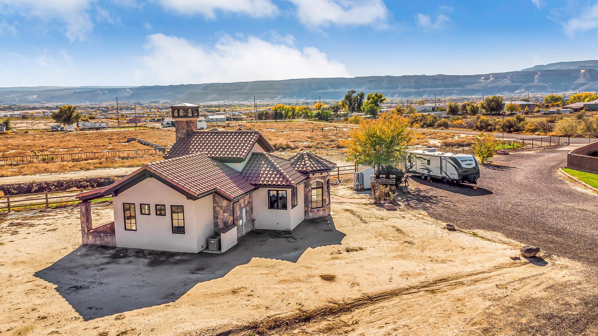 2224 H Road Grand Junction, CO 81505 - Photo 10 of 42 a view of a terrace with wooden floor and ocean view