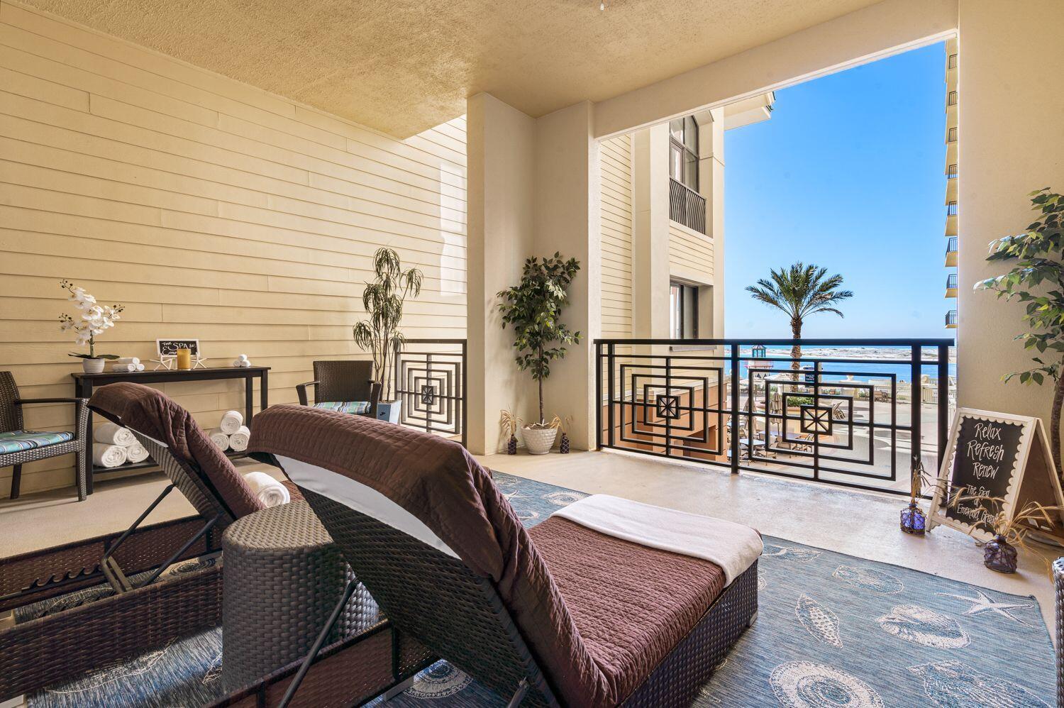 10 Harbor Boulevard, Unit E405A Destin, FL 32541 - Photo 8 of 9 a bedroom with furniture and a window