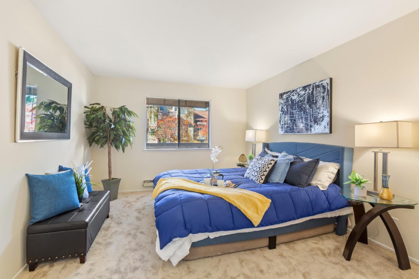 2250 Monroe Street, Unit 111 Santa Clara, CA 95050 - Photo 11 of 20 a bedroom with a bed and couch