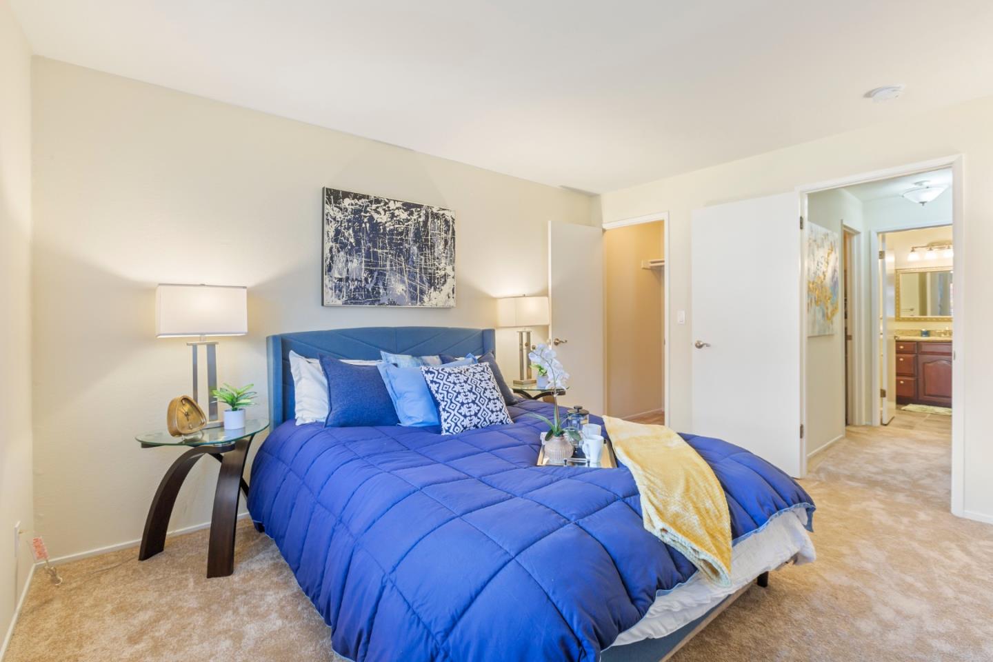 2250 Monroe Street, Unit 111 Santa Clara, CA 95050 - Photo 12 of 20 a bedroom with a bed and lamp