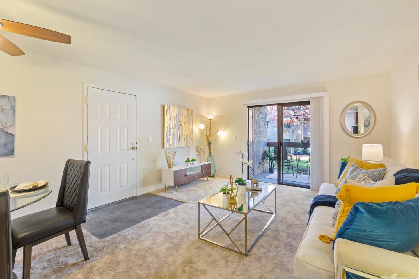 2250 Monroe Street, Unit 111 Santa Clara, CA 95050 - Photo 2 of 20 a living room with furniture and a lamp