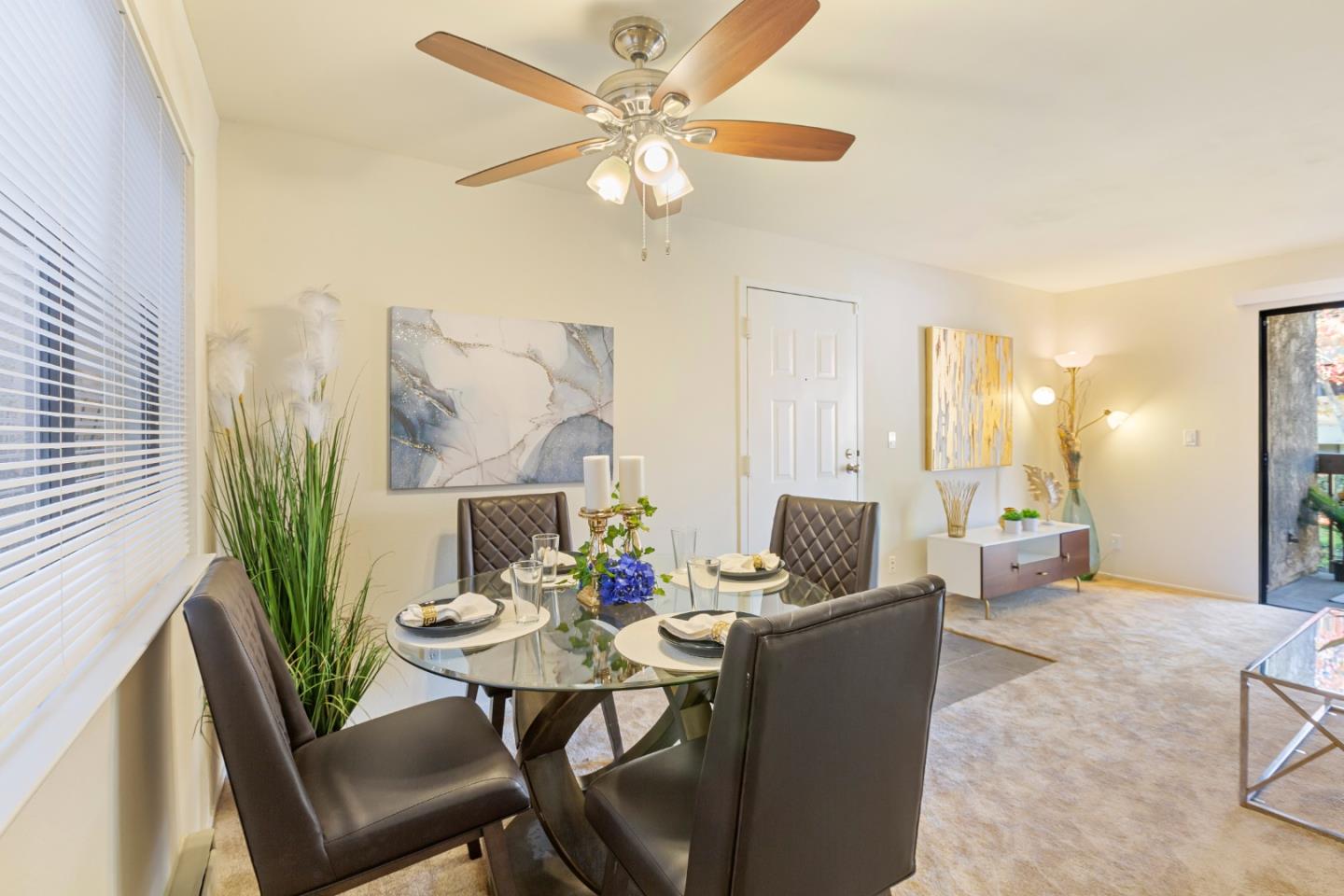 2250 Monroe Street, Unit 111 Santa Clara, CA 95050 - Photo 7 of 20 a living room with furniture and a large window