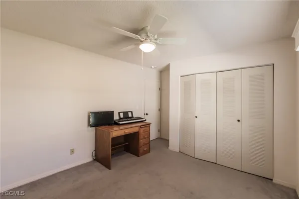 a room with furniture and chandelier