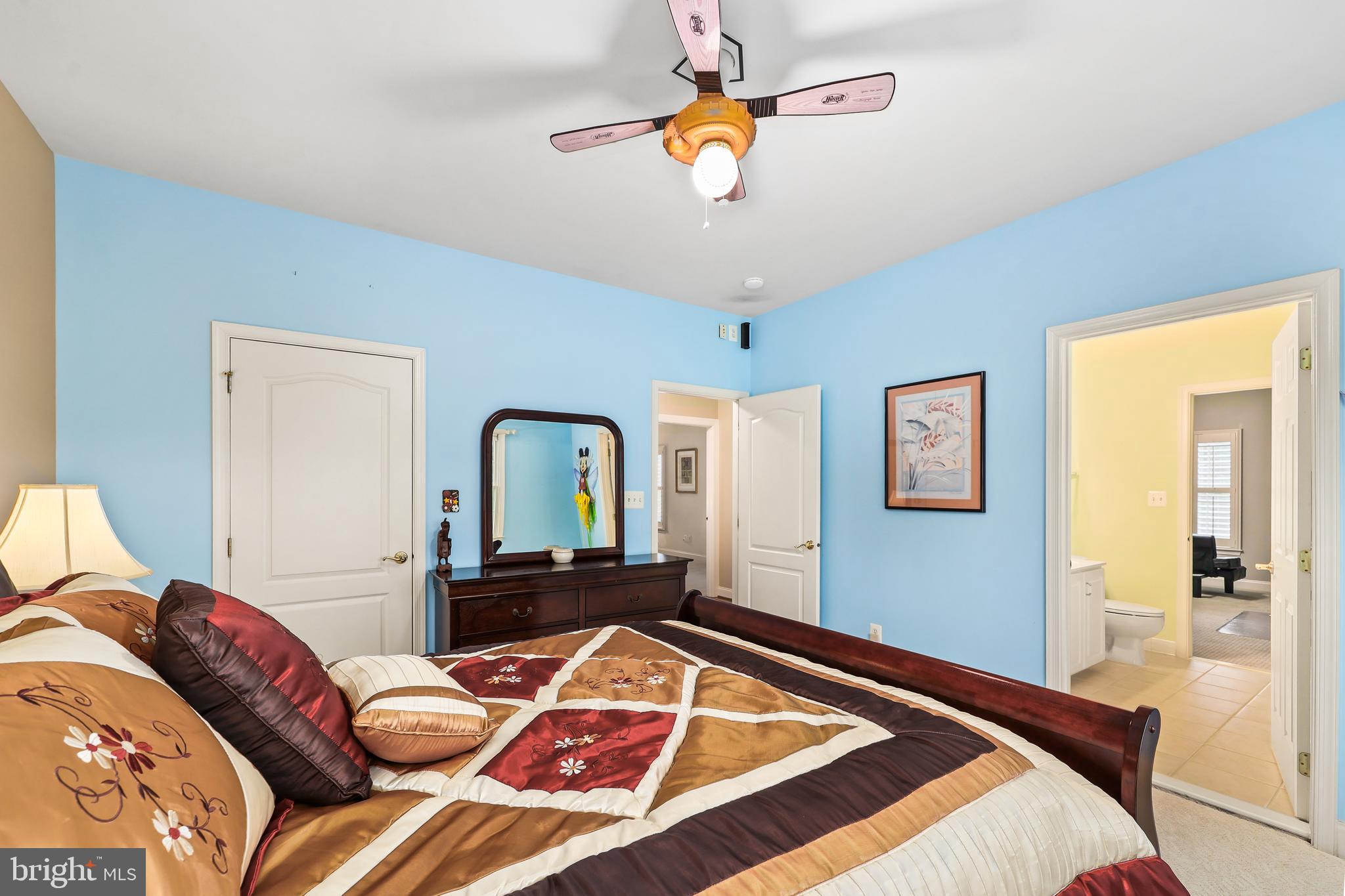 40890 Beechnut Road Leesburg, VA 20175 - Photo 36 of 65 a bed sitting in a bedroom next to a window