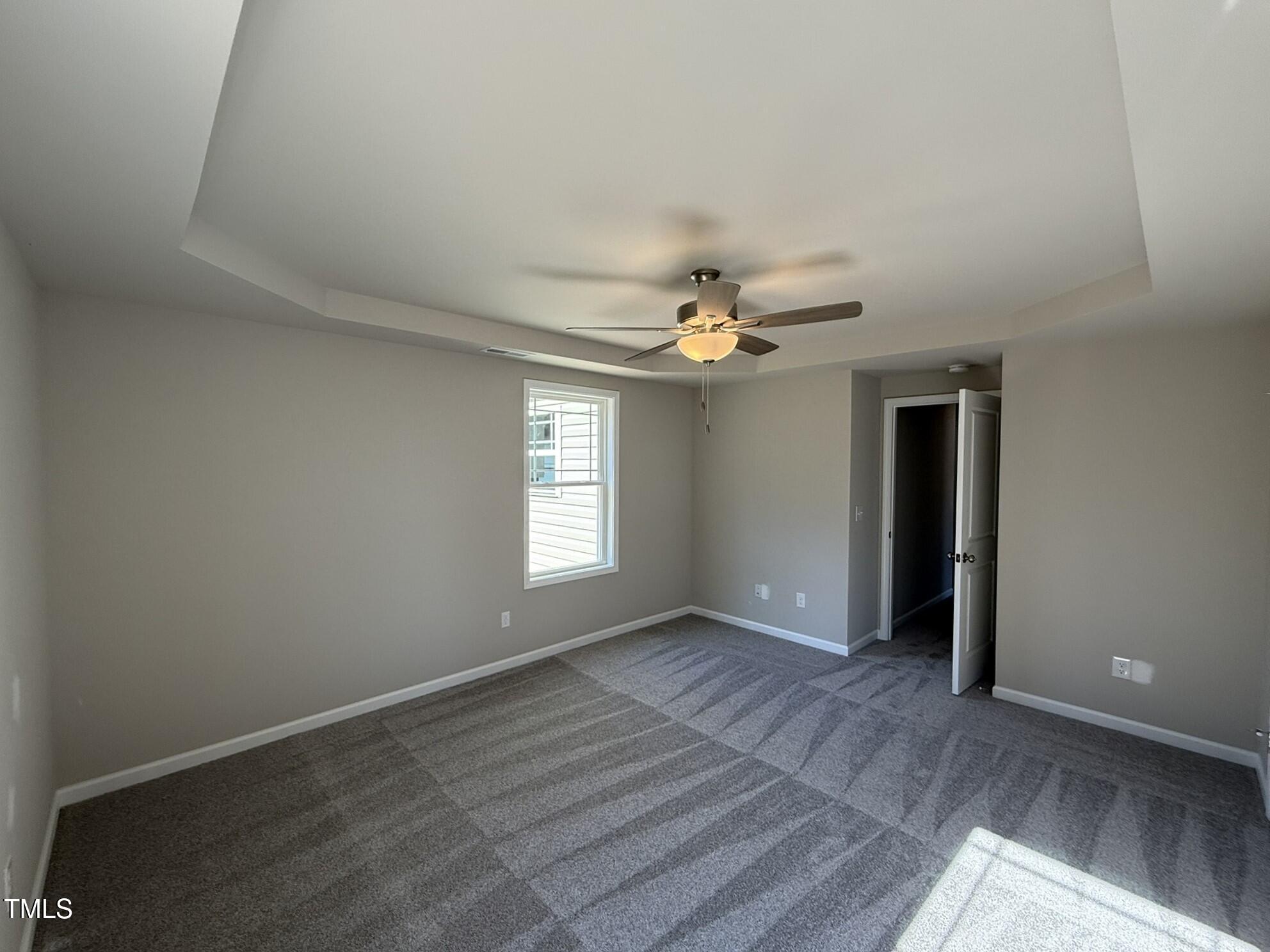 175 Magnolia Run Way Benson, NC 27504 - Photo 14 of 19 wooden floor in an empty room with a window
