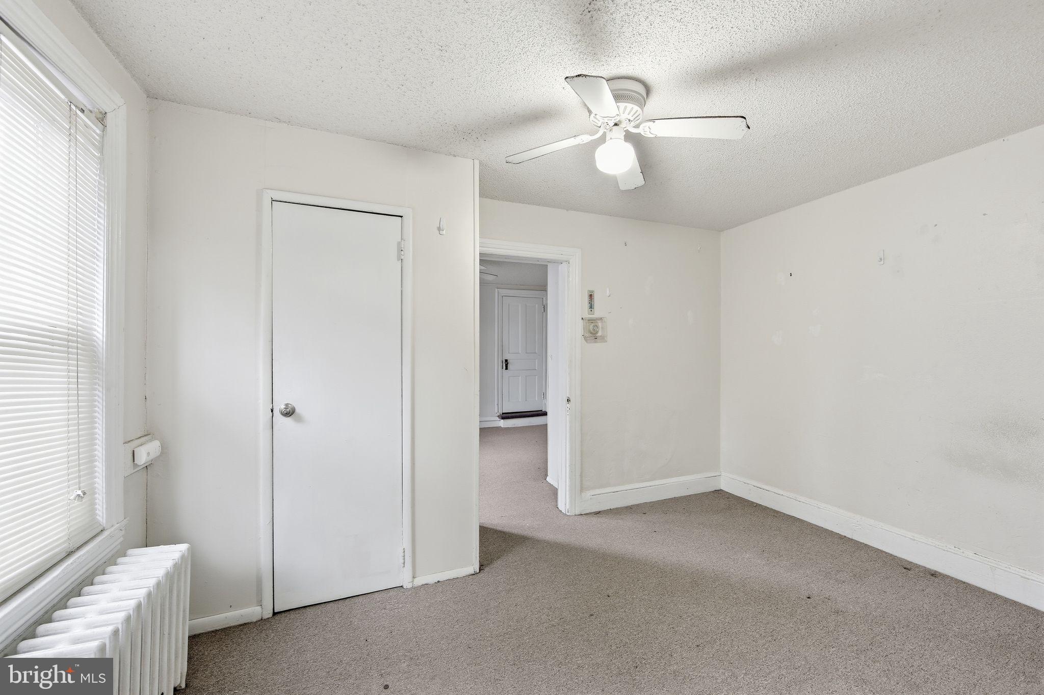 238 Highland Avenue Wayne, PA 19087 - Photo 12 of 17 wooden floor in an empty room with a window