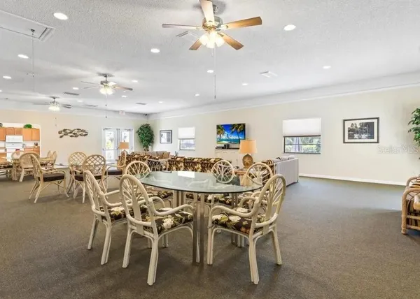 a room with gym equipment and a large window