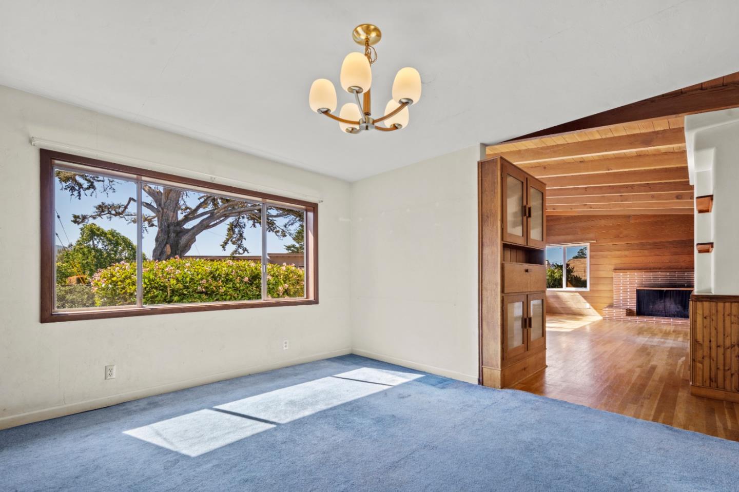 3281 Trevis Way Carmel, CA 93923 - Photo 3 of 16 a view of a hallway with wooden floor and a large window