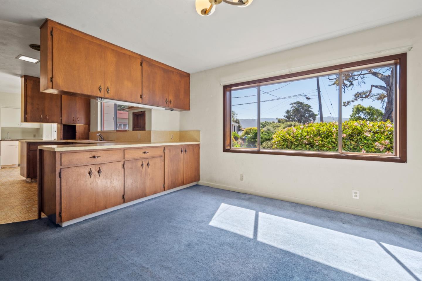 3281 Trevis Way Carmel, CA 93923 - Photo 4 of 16 a view of a kitchen with fridge and window