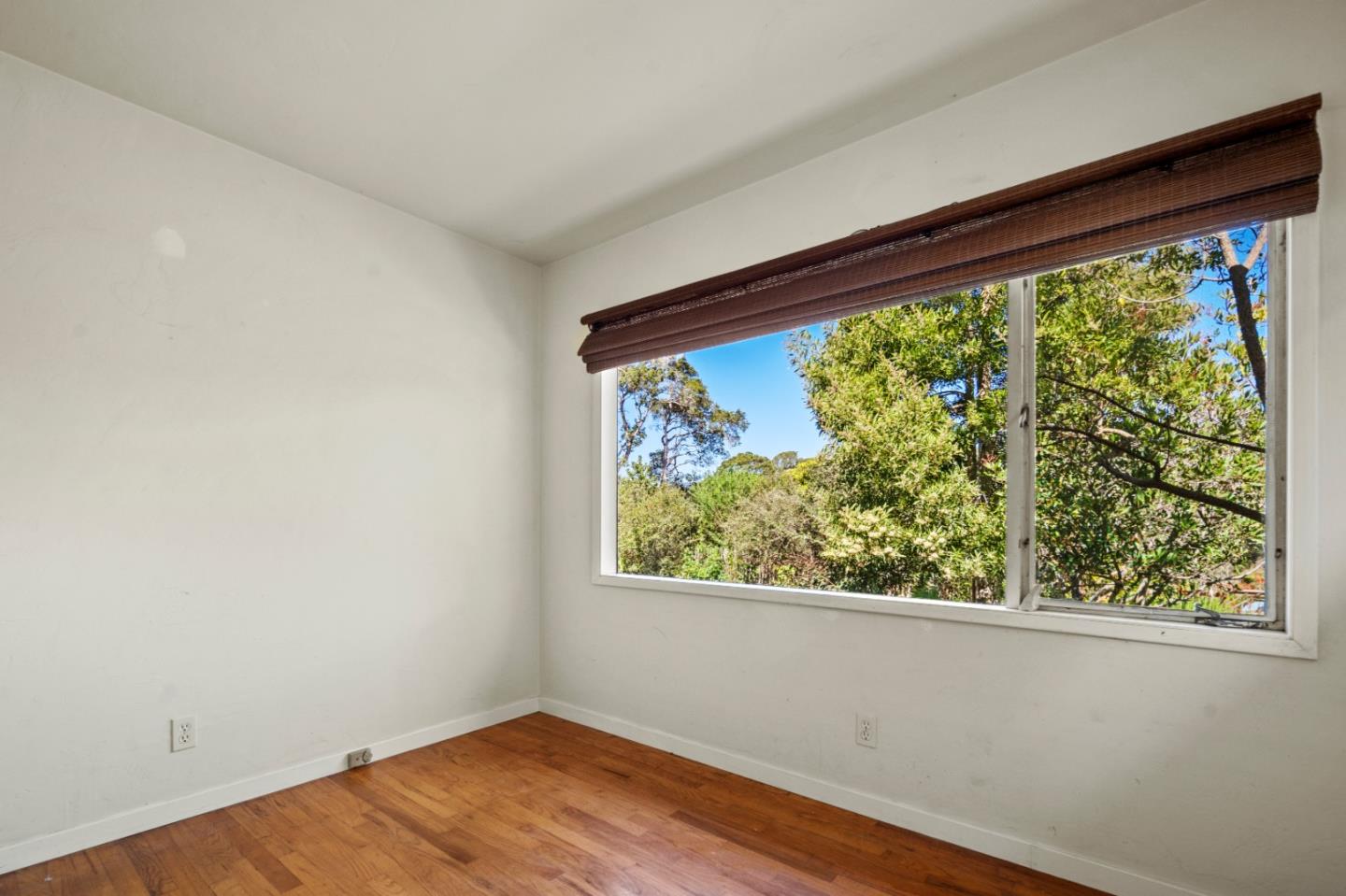 3281 Trevis Way Carmel, CA 93923 - Photo 7 of 16 a view of a room with wooden floor and a window