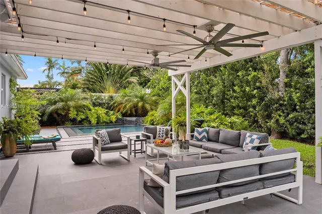 a outdoor living space with furniture and garden view