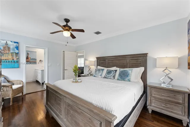 a bathroom with a sink vanity and mirror