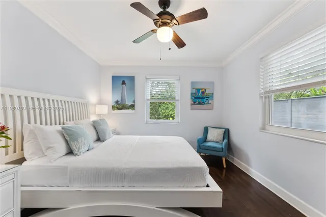 a bathroom with a toilet a sink and a mirror