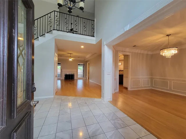 a view of a hallway with a room