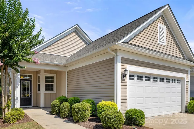 a view of a house with a garage