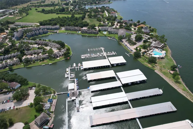 an aerial view of a house with a garden