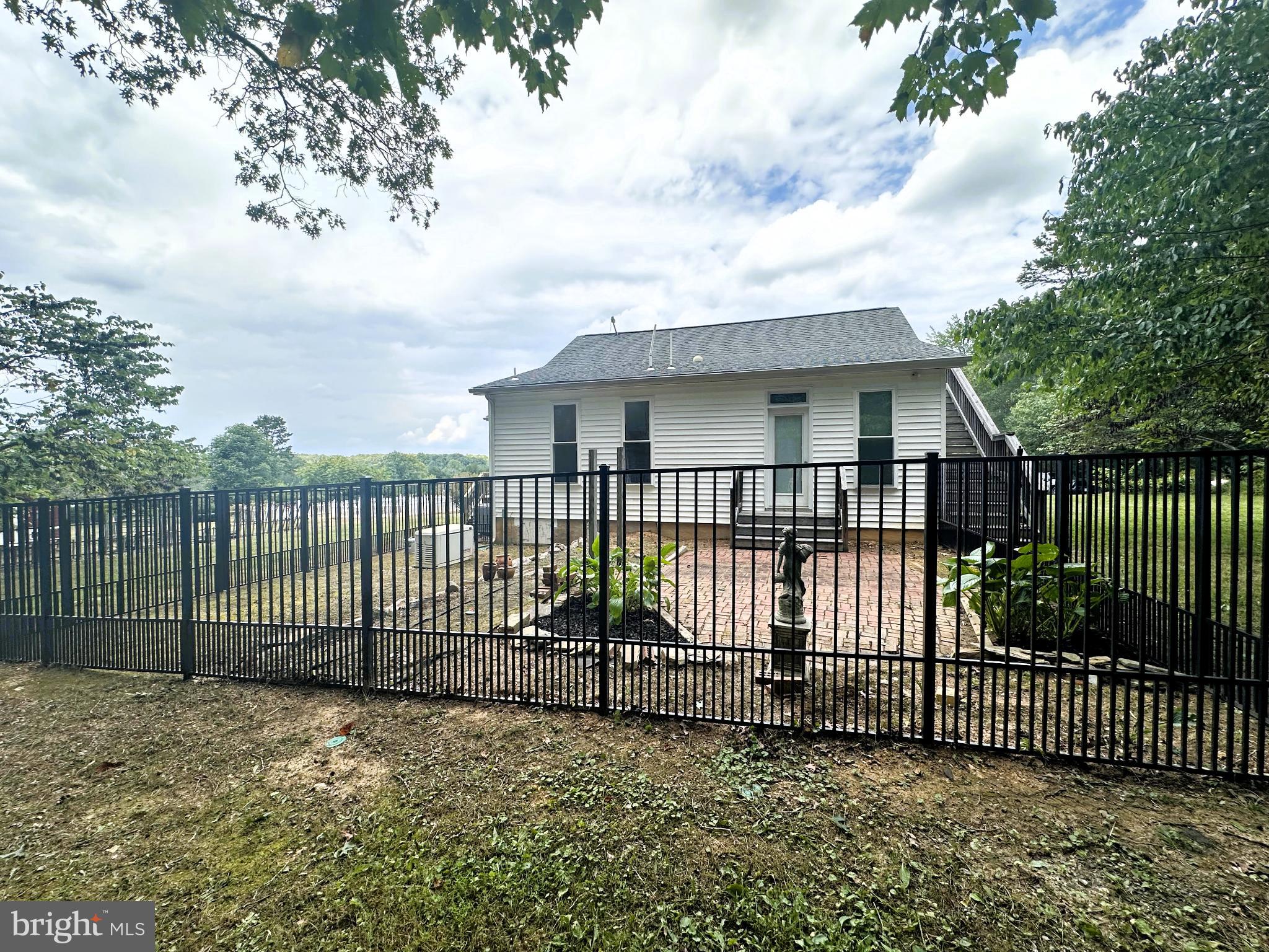 29274 Old Rhoadesville, VA 22542 - Photo 14 of 51 a view of a wrought iron fences in front of house