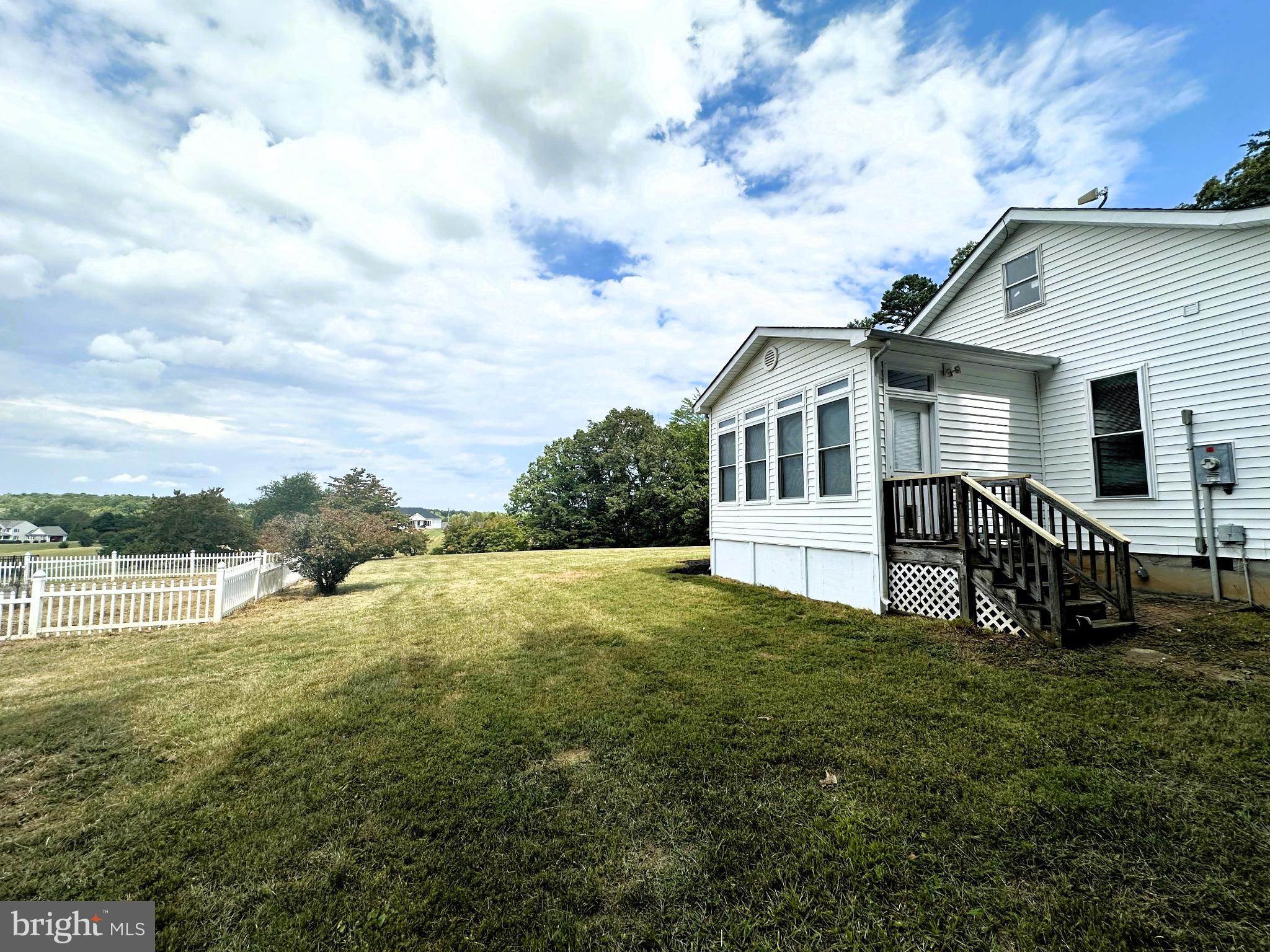 29274 Old Rhoadesville, VA 22542 - Photo 16 of 51 a view of a house with a yard
