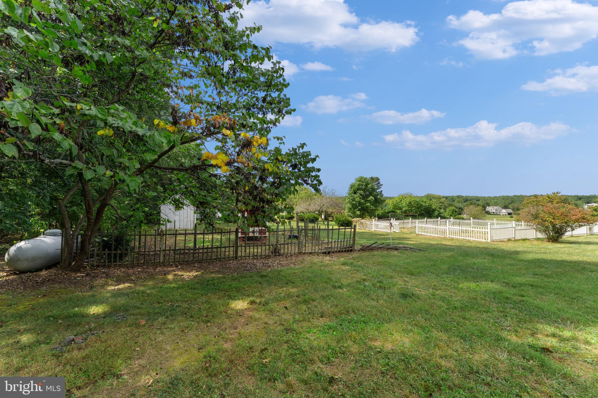 29274 Old Rhoadesville, VA 22542 - Photo 18 of 51 a view of a garden with a fountain