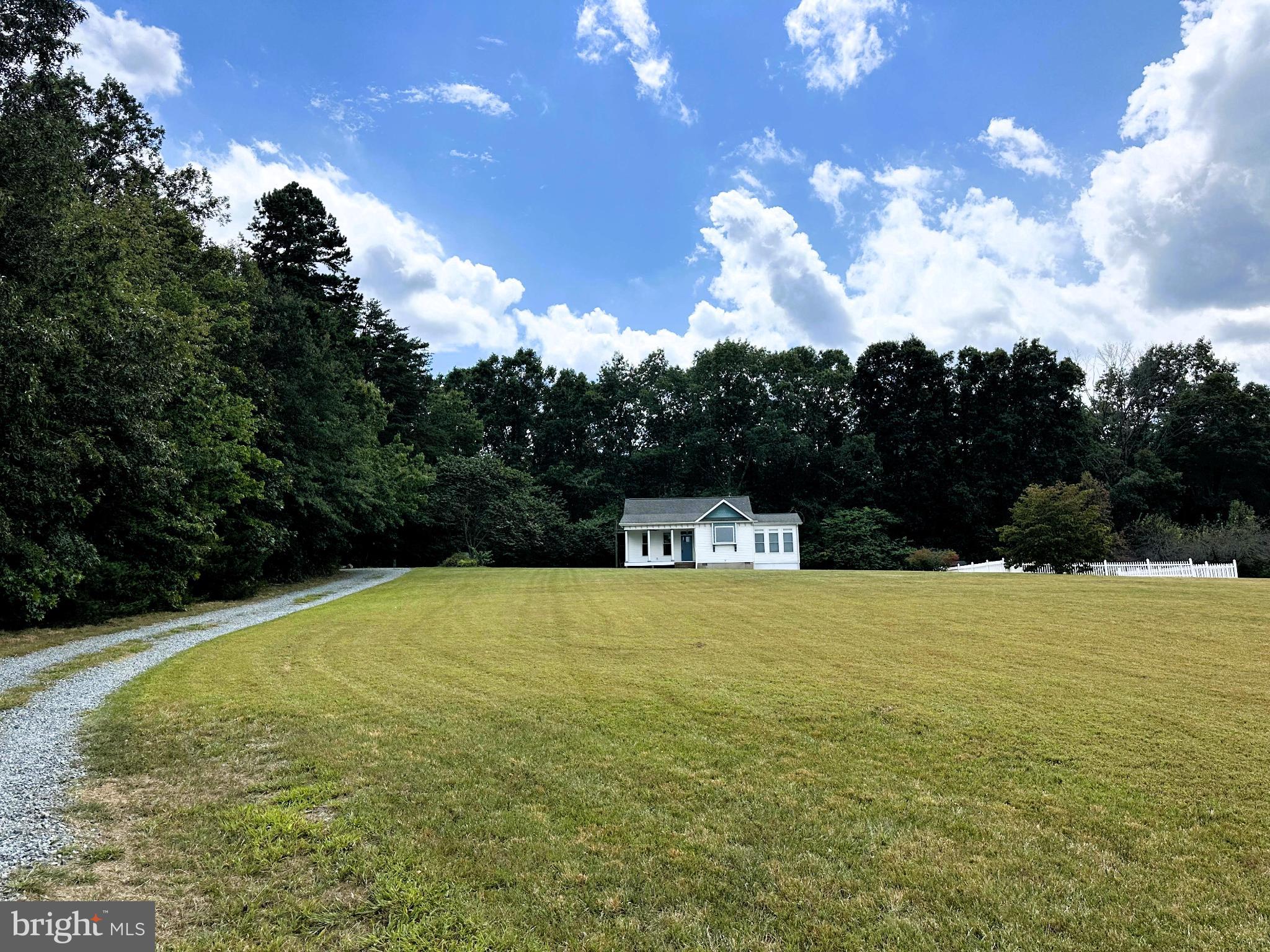 29274 Old Rhoadesville, VA 22542 - Photo 19 of 51 a view of a swimming pool with an outdoor space and seating area