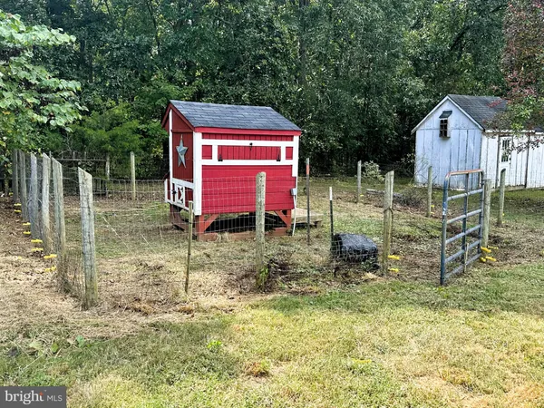 a view of backyard with green space