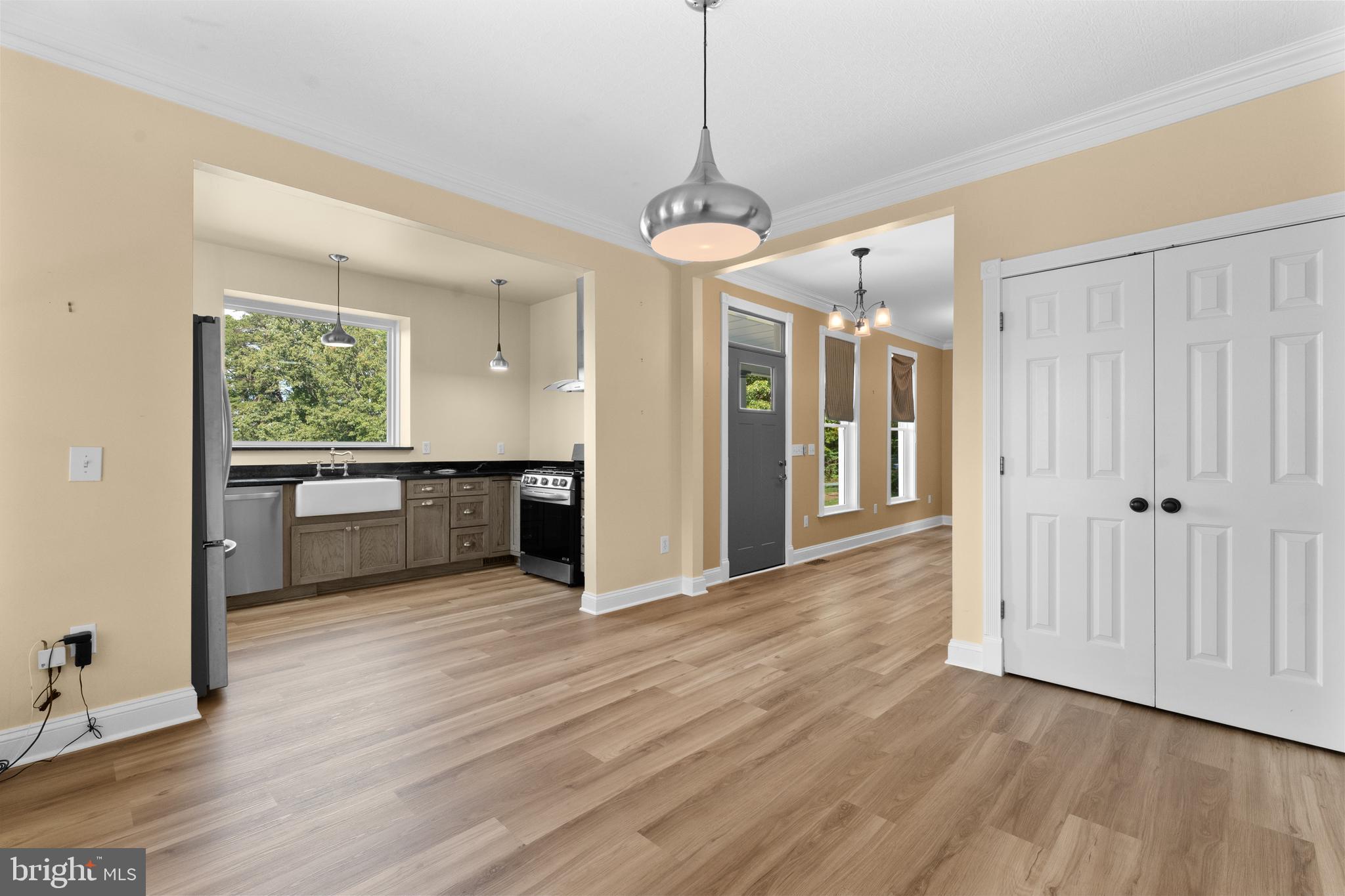 29274 Old Rhoadesville, VA 22542 - Photo 34 of 51 a view of a kitchen with an entryway and wooden floor