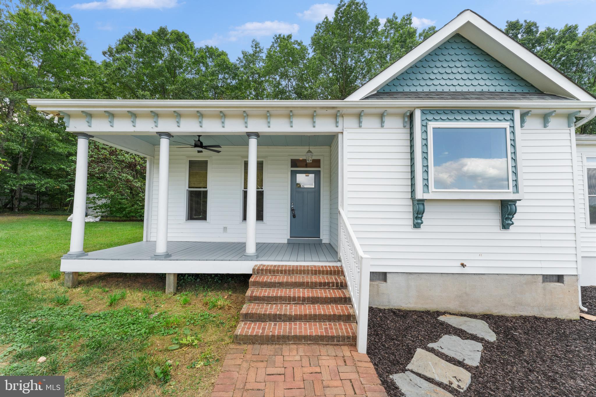 29274 Old Rhoadesville, VA 22542 - Photo 4 of 51 a front view of a house with a yard