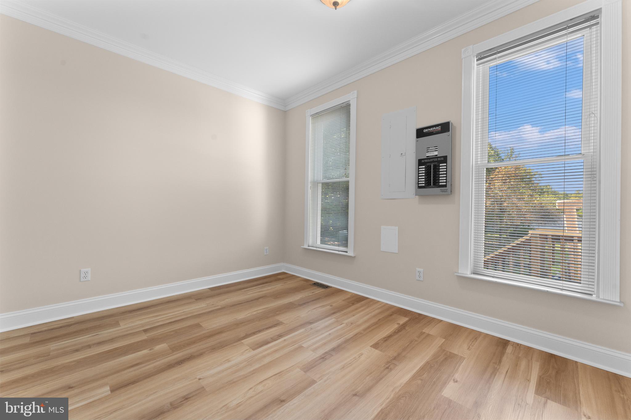 29274 Old Rhoadesville, VA 22542 - Photo 42 of 51 a view of an empty room with wooden floor and a window