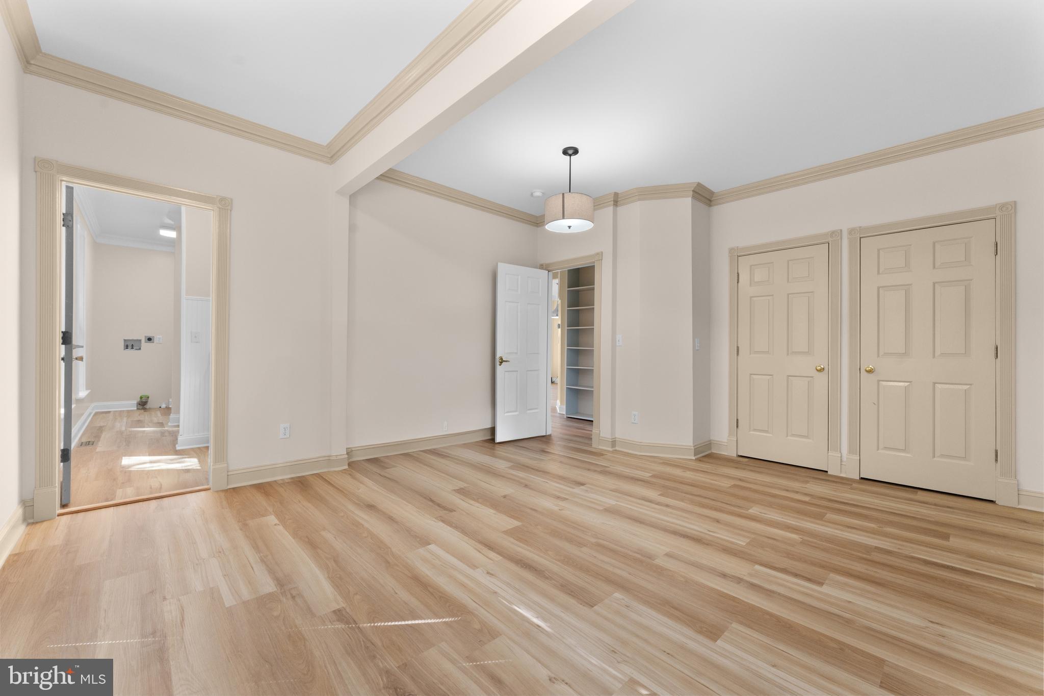 29274 Old Rhoadesville, VA 22542 - Photo 45 of 51 a view of an empty room with wooden floor and a bathroom