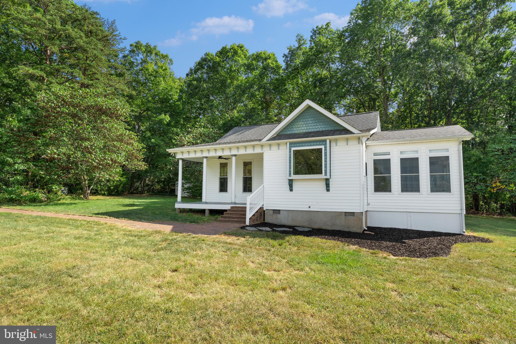 29274 Old Rhoadesville, VA 22542 - Photo 5 of 51 a view of a house with a yard