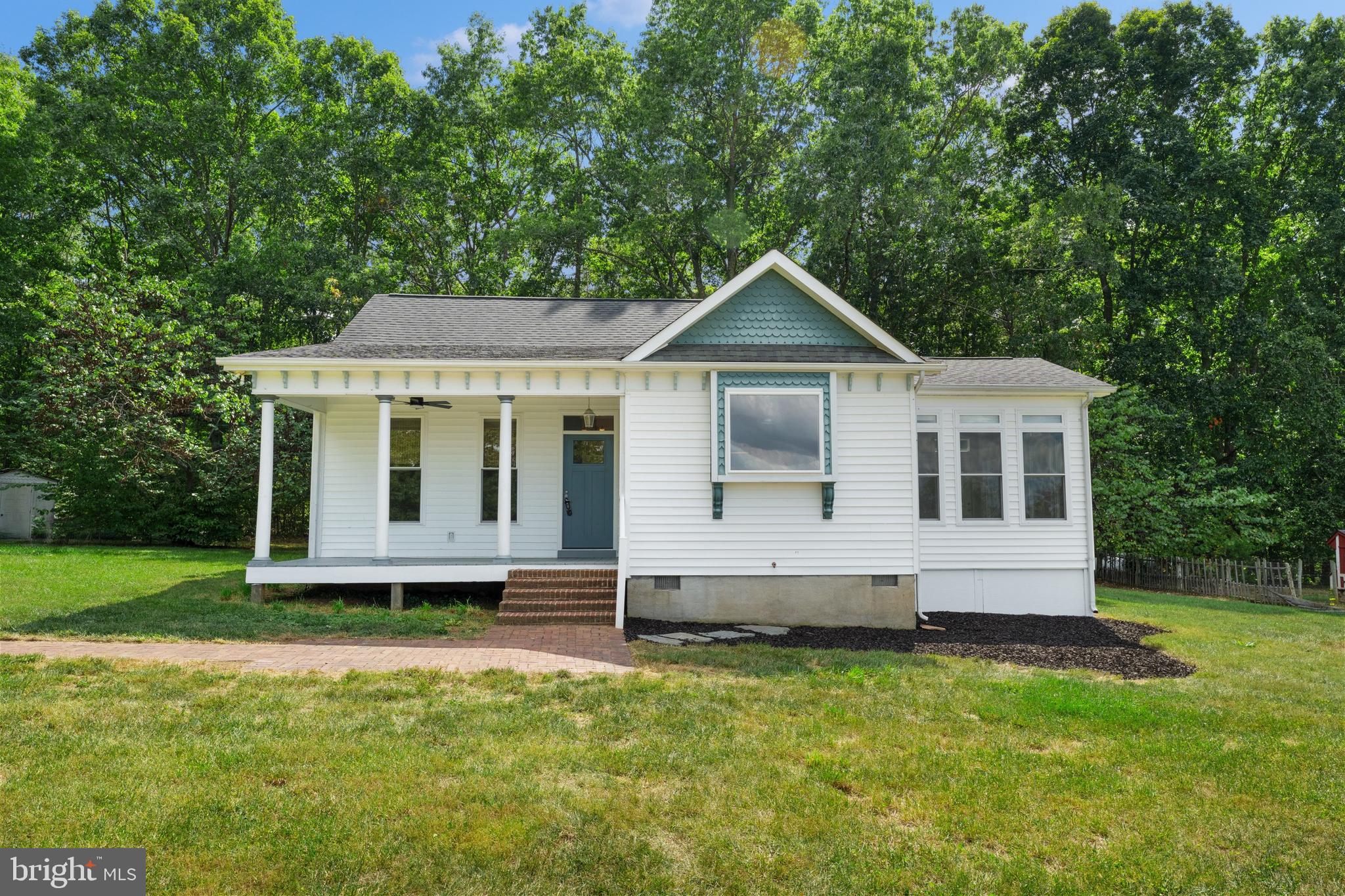 29274 Old Rhoadesville, VA 22542 - Photo 51 of 51 a front view of a house with a yard