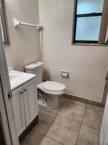 a bathroom with a toilet