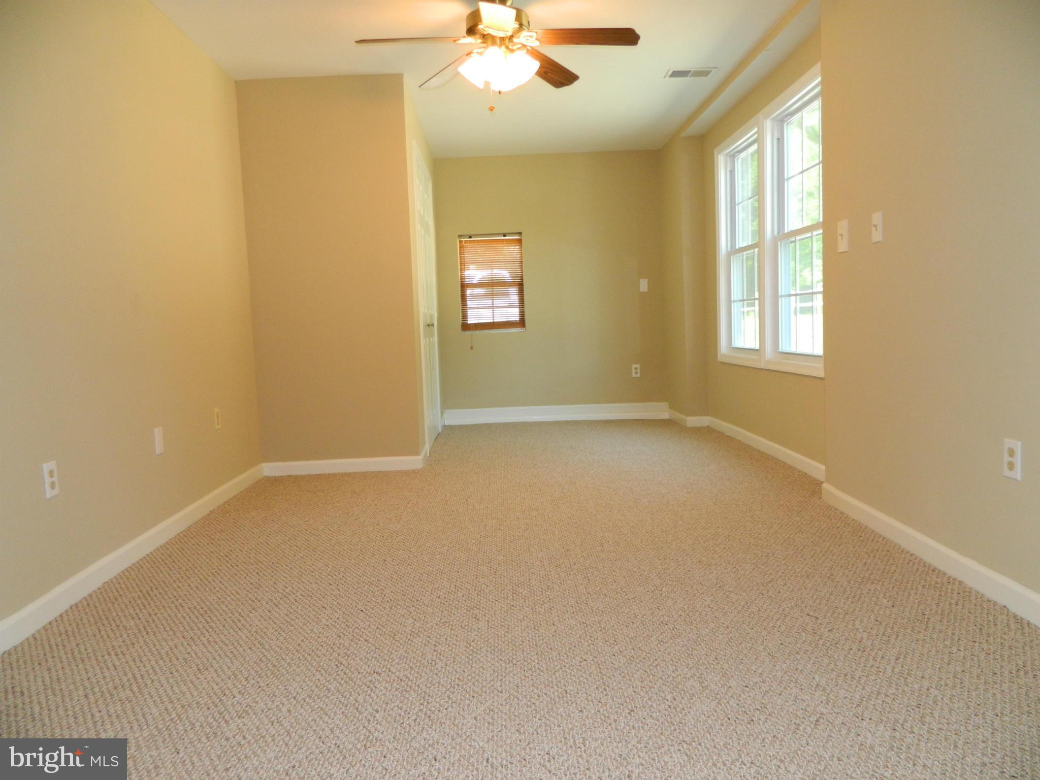 1568 St Margarets Road Annapolis, MD 21409 - Photo 13 of 28 Bedroom with New Berber Carpeting and Ceiling Fan